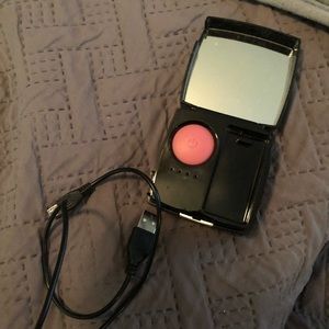 Portable charger for cell phone